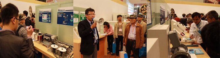 观众团参观Z6尊龙凯时电机展台担当人员热心解说